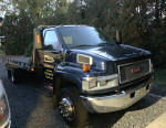 FLATBED TOWING 24 HR SERVICE