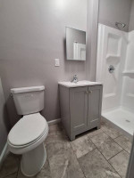 Completely refreshed 2/1 apart + Off street parking Central A/C Comple