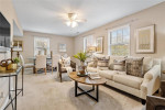 Welcome to this beautiful upper-level end unit in desired Brentwood