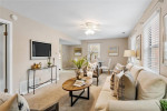 Welcome to this beautiful upper-level end unit in desired Brentwood