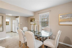 Welcome to this beautiful upper-level end unit in desired Brentwood