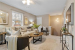 Welcome to this beautiful upper-level end unit in desired Brentwood