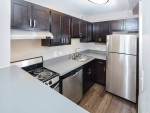 Beautiful unit with hardwood floors, gym, sundeck w grills, pool