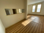 Heat is included in this bright and cheerful cat-friendly apt