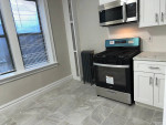 NO FEE Incredible All New 1BR,SS EiK,Pking OP,Lndry,1 blk Blvd East