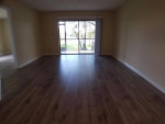 First-floor entry with screened patio