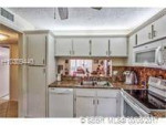 DESIRABLE FIRST FLOOR CORNER UNIT!