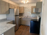 NEW EVERYTHING! ONE LEVEL DUPLEX W/GARAGE!