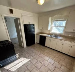 2 bedroom, 1 bathroom home near UMKC campus. All black appliances !!