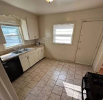 2 bedroom, 1 bathroom home near UMKC campus. All black appliances !!