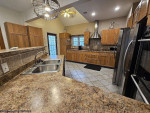 Contemporary home with 5 bedrooms 3.5 bathrooms. Large Game room or th
