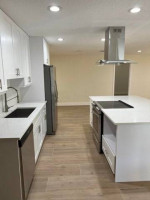 MODERN LUXURY ! 3/2 ! PORCELAIN FLOORING ! SS APPS ! NEW APPLIANCES !