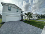 STUNNING 4/2.5 ! SS APPS ! LAUNDRY ! IMPACT WINDOWS!FACILITIES NEARBY!