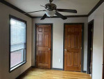 Two bedroom are upstairs with a full bath.