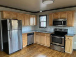 Two bedroom are upstairs with a full bath.