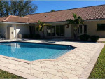 SINGLE-FAMILY GEM, WITH AN OPEN FLOORPLAN POOL FENCED YARD