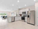 This gorgeous quick move-in Springdale two-story townhome enjoys a wat