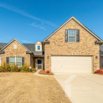 REDUCED - 3/2 Brick Home w/Garage & Community Pool! Must See!