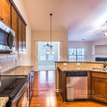 REDUCED - 3/2 Brick Home w/Garage & Community Pool! Must See!