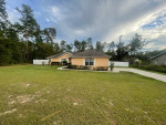 Great Ocala 3BR/2BA home with attached garage and fenced yard