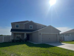 5BR/3.5BA two story Ocala home with large enclosed backyard.