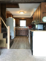 Lakefront home: private, quiet, yard, sandy beach, dock, huge deck