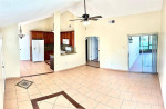 OPEN-CONCEPT HOME FLOOR PLAN WITH TILE FLOORING KITCHEN WITH GRANITE
