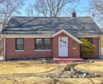 Nestled on a 2.1 acre lot with mature trees, extra parking and lovely