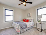 Nestled on a 2.1 acre lot with mature trees, extra parking and lovely