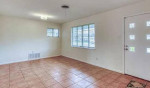 This is 2 spacious bedrooms with walk-in closets, a remodeled 1 bath