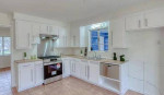 This is 2 spacious bedrooms with walk-in closets, a remodeled 1 bath