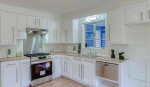 This is 2 spacious bedrooms with walk-in closets, a remodeled 1 bath