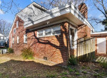 Large open floor plan living, dining, kitchen, half bath.