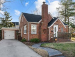 Large open floor plan living, dining, kitchen, half bath.