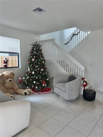 This elegant single family home corner lot! exit 9