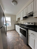 CAT ALLOWED!! 2 bed 1.5 bath End unit, deck, Fireplace.