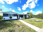Beautifully renovated 3/2 with open kitchen, quartz countertops!