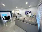 Beautifully renovated 3/2 with open kitchen, quartz countertops!