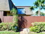 Lake Worth Living: Elegant 2BR/2.5BA Townhome with Fenced Courtyard!