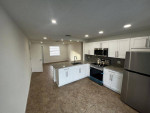 MODERN STYLISH ! 2-1 ! NEW APPLIANCES ! BALCONY ! A/C ! LAUNDRY !TILE!