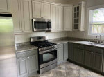 Three level plus basement, granite, fenced in yard, no fees for pets!