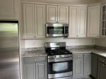 Three level plus basement, granite, fenced in yard, no fees for pets!