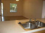 RELAX AND ENJOY PARADISE IN THIS SPACIOUS 2BR/2BA WATERFRONT TOWNHOUSE