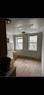 Spacious second-floor apartment with large kitchen