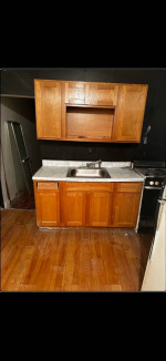 Spacious second-floor apartment with large kitchen