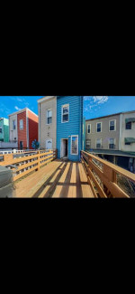 A CHARMING TOWNHOUSE 1 BLOCK TO TRAIN MINUTES TO WTC