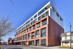 Bright / stylish corner townhome with parking at Junction House!