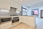 Bright / stylish corner townhome with parking at Junction House!