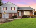 Ideal split-level residence strategically located near convenient comm