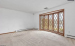 Ideal split-level residence strategically located near convenient comm